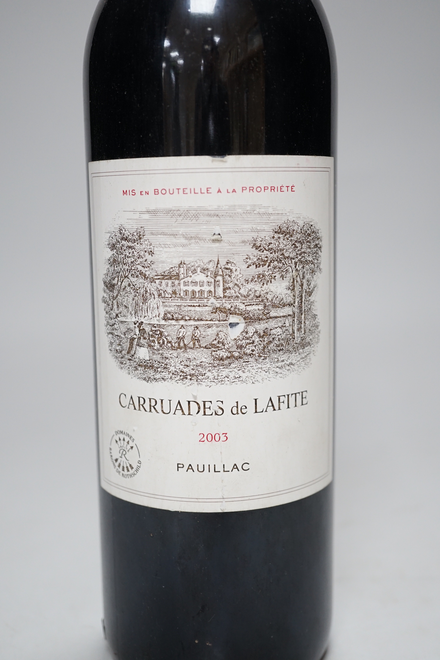 A bottle Carruades de Lafite 2003